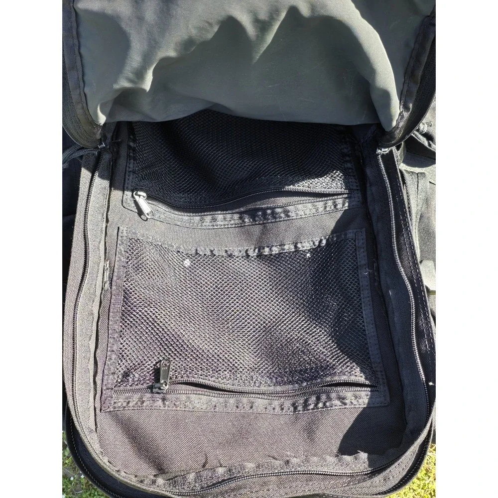 black tactical backpack is a Sandpiper of California Bugout Bag **see Pics**